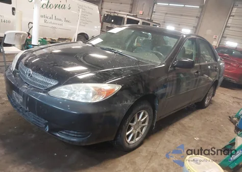 2004 Toyota Camry Le z USA, uszkodzony, nr VIN 4T1BE32KX4U299209